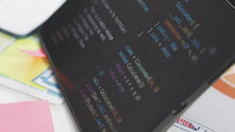 UX/UI designer working on wireframes for a website and mobile app prototype.. Stock Footage 309838193
