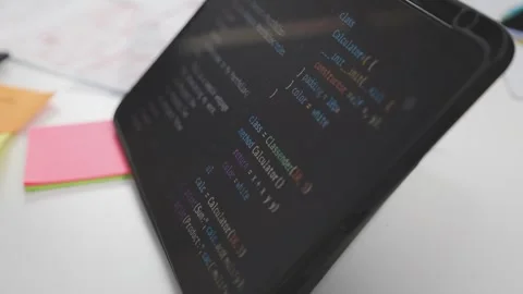 UX/UI designer working on wireframes for a website and mobile app prototype.. Stock Footage 309838293