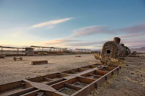Uyuni. Low Angle View Of Blue Sky Over Old Abandoned Train At Cemetery Ilustração Stock