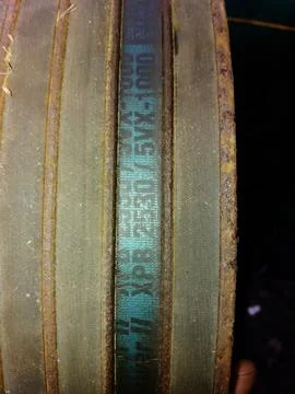 V Belt Placed on a Pulley System in an Industrial Workshop for Machinery Op.. Stock Photos