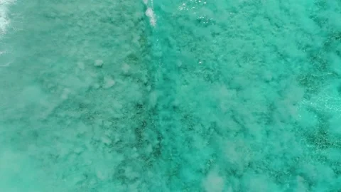 V A drone takes off over the ocean in the Seychelles Stock Footage 155401358