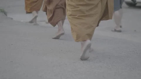 (V-LOG) Monks Walking Bare Feet From Behind During Morning Pindapatta Stock Footage 255919680