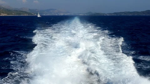 V shaped pattern of Kelvin wake lines from behind a fast ship Stock Footage 92032987