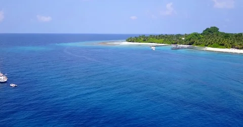 V04245 Aerial flying drone view of Maldives white sandy beach on sunny tropical Stock Footage