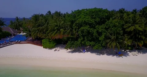 V04247 Aerial flying drone view of Maldives white sandy beach on sunny tropical Stock Footage