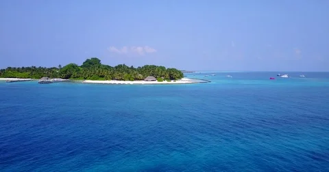 V04256 Aerial flying drone view of Maldives white sandy beach on sunny tropical Stock Footage