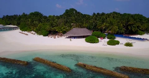V04279 Aerial flying drone view of Maldives white sandy beach on sunny tropical Stock Footage