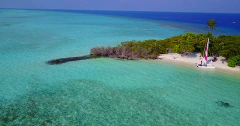 V04296 Aerial flying drone view of Maldives white sandy beach on sunny tropical Stock Footage