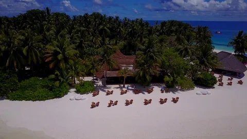V04547 Aerial flying drone view of Maldives white sandy beach on sunny tropical Stock Footage