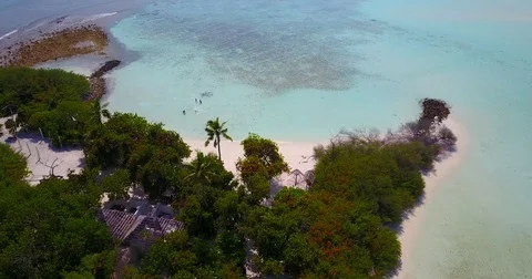 V04624 Aerial flying drone view of Maldives white sandy beach on sunny tropical Stock Footage