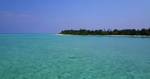 V04695 Aerial flying drone view of Maldives white sandy beach on sunny tropical Stock Footage