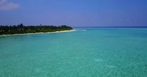 V04768 Aerial flying drone view of Maldives white sandy beach on sunny tropical Stock Footage