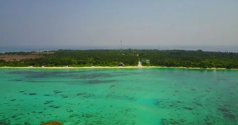 V04931 Aerial flying drone view of Maldives white sandy beach on sunny tropical Stock Footage