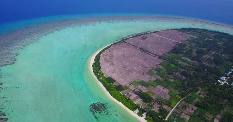 V05036 Aerial flying drone view of Maldives white sandy beach on sunny tropical Stock Footage