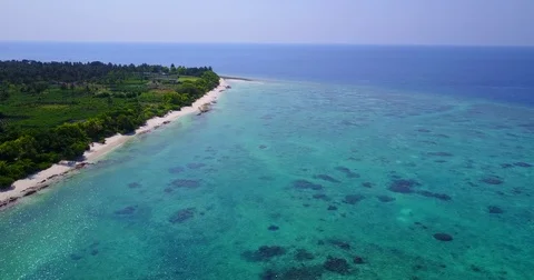 V05115 Aerial flying drone view of Maldives white sandy beach on sunny tropical Stock Footage