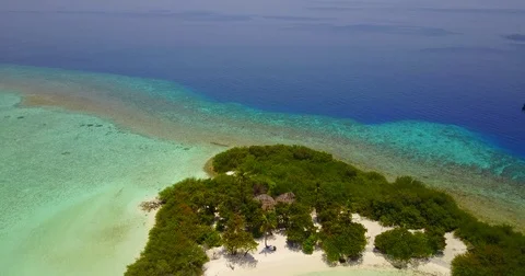 V05138 Aerial flying drone view of Maldives white sandy beach on sunny tropical Stock Footage