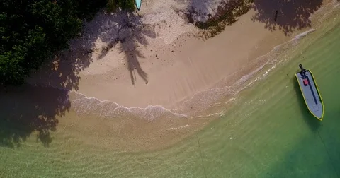 V05456 Aerial flying drone view of Maldives white sandy beach on sunny tropical Stock Footage