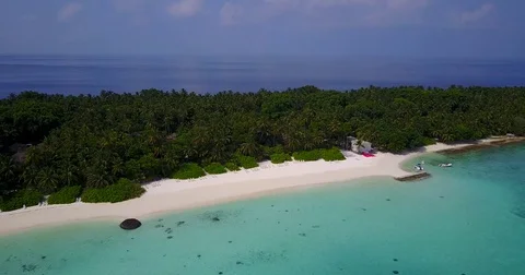 V05729 Aerial flying drone view of Maldives white sandy beach on sunny tropical Stock Footage