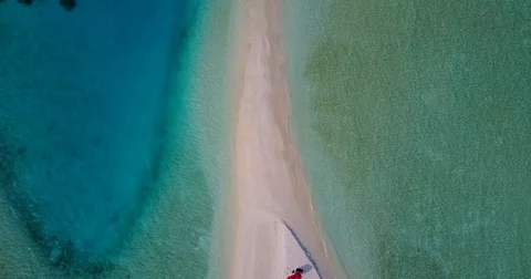 V05959 Aerial flying drone view of Maldives white sandy beach on sunny tropical Stock Footage