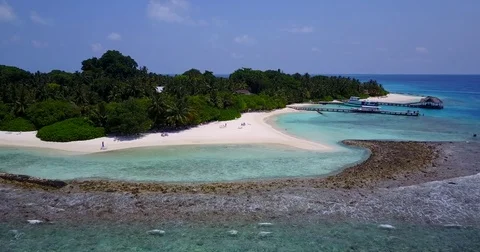 V05990 Aerial flying drone view of Maldives white sandy beach on sunny tropical Stock Footage