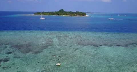 V06119 Aerial flying drone view of Maldives white sandy beach on sunny tropical Stock Footage