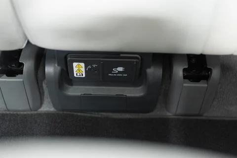 V2L VTOL device that allows to connect various electrical devices to the battery Fotos Stock