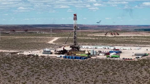 Vaca Muerta, Argentina, October 27, 2025: Aerial view of a drilling rig for.. Stock Footage 321552297