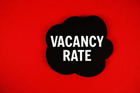 Vacancy Rate text with speech bubble on red background Stock Photos