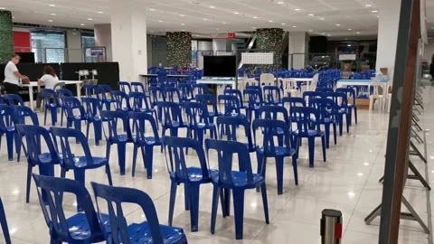 Vacant and Empty Chairs on Line in a Vaccination Area Stock Footage 167042648