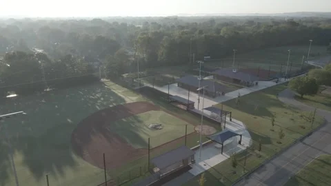 Vacant baseball and tennis fields open Stock Footage 311944176