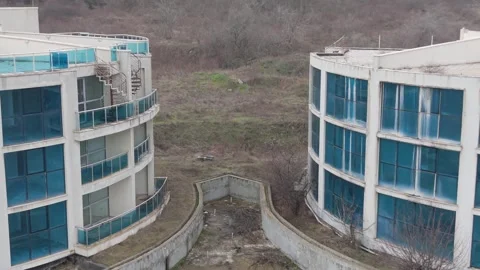 Vacant housing development surrounded by plowed fields and rural terrain Video stock 328828687