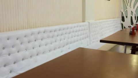 Vacant table and chair kept for indoor dining at night Stock Footage 303262480