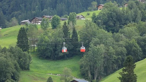 Vacation in the Alpine mountains. Cable car Stock Footage