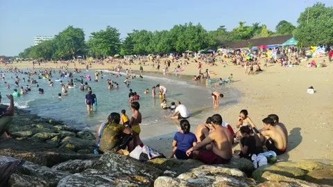 Vacation and bathing at Sanur Beach, Bali, Indonesia on May 22, 2022 Видео 199763081