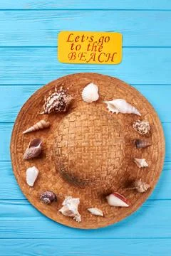 Vacation background, hat, sea shells. Photos