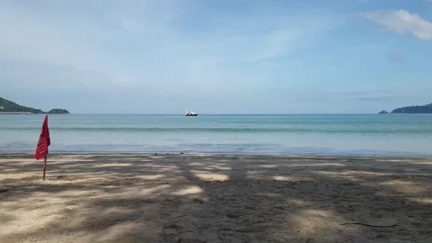 Vacation on the beach with a boat floating away Stock Footage 164547602