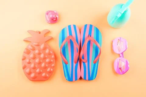 Vacation on the beach with flip flops, glasses Stock Photos