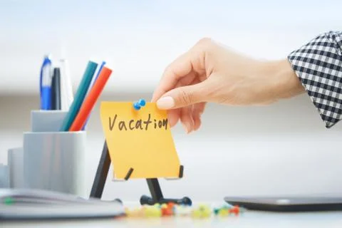 Vacation text on adhesive note Stock Photos