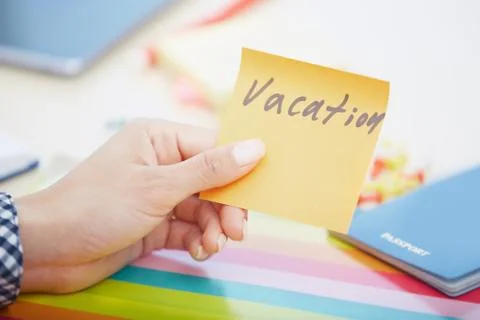 Vacation text on adhesive note Stock Photos