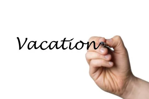 Vacation written by a hand Stock Photos