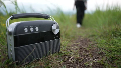 Vacationer Put On Stone Beach Old Vintage Retro Radio Tape Recorder And Puts On Stock Footage 219844013