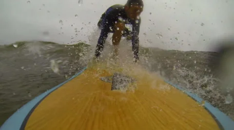 A vacationer surfs Stock Footage 42542714