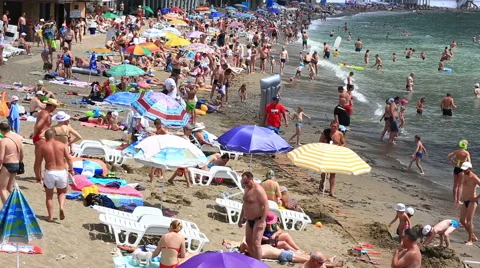 Vacationers on a beach in the Crimea Stock Footage 63296344