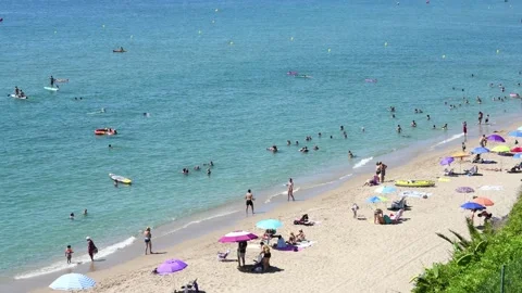 Vacationers on the beach Stock Footage 137900816