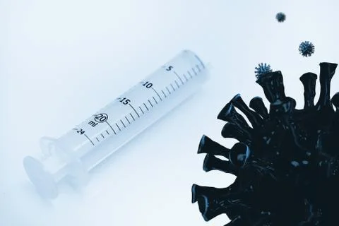 Vaccination and immunization concept. Close up shot on the syringe Stock Photos