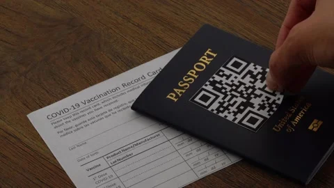 Vaccination card and QR code passport Stock Footage 159561548