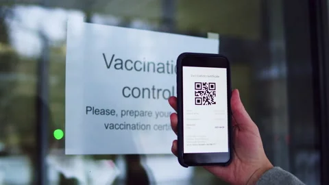Vaccination passport qr code control, checking on phone European coronavirus Stock Footage 165754393