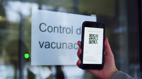 Vaccination passport qr code control, checking on phone European coronavirus Stock Footage 165755507