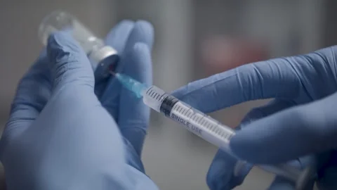 Vaccination syringe macro 9 Stock Footage 148008652