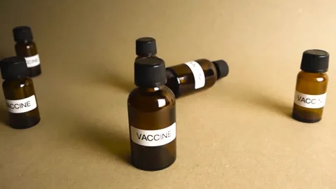 Vaccine bottles distribution and development concept 動画素材 342652796